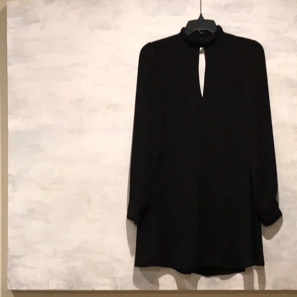Black long sleeve mini dress. Only worn once.